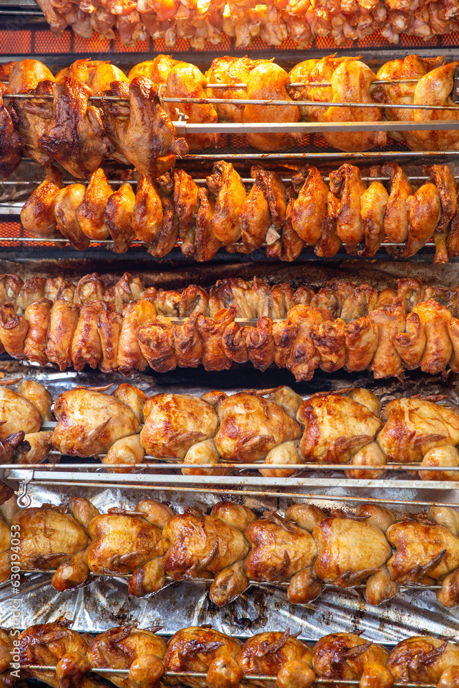 Rotisserie chicken on a rack