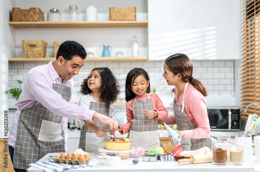 Portrait of enjoy happy love asian family father and mother with little asian girl daughter child play and having fun cooking food together with baking cookie and cake ingredient in kitchen Portrait of enjoy happy love asian family father and mother with little asian girl daughter child play and having fun cooking food together with baking cookie and cake ingredient in kitchen