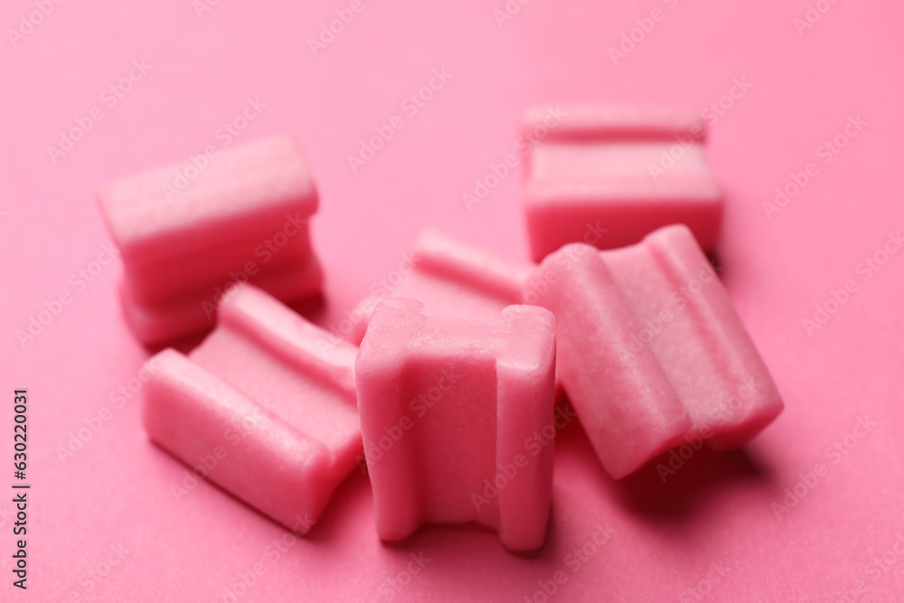 Tasty chewing gums on pink background, closeup Tasty chewing gums on pink background, closeup