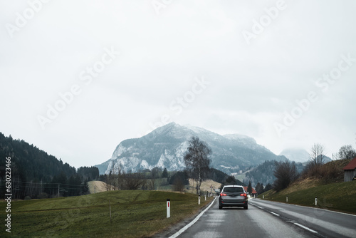 Mountain road landscape. road scene in colorful nature. Nature landscape on beautiful highway. car driving on the highway in summer. stunning highway scenery in europe. © AlexGo