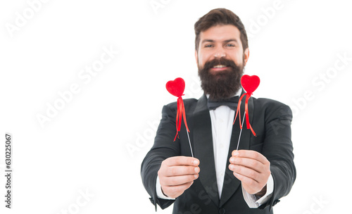 Gift with love. tuxedo man on formal event. special occasion party. male groom on wedding ceremony. going to make proposal. bearded man red hearts. love symbol. happy valentines day. love is blind