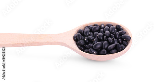 Wooden spoon with raw kidney beans isolated on white