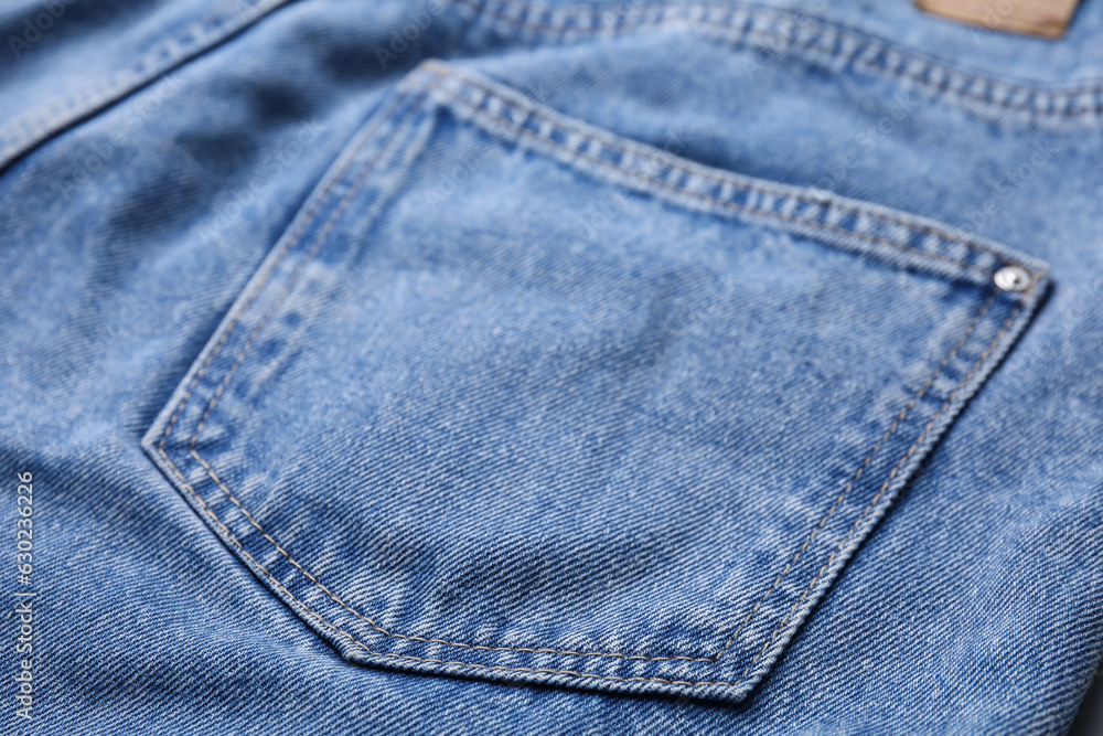 Jeans with pocket as background, closeup view Jeans with pocket as background, closeup view