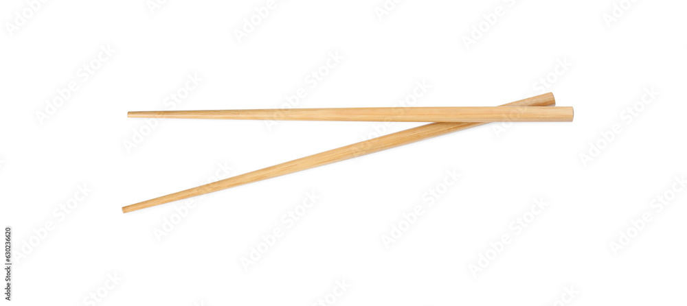 Pair of wooden chopsticks isolated on white, top view Pair of wooden chopsticks isolated on white, top view
