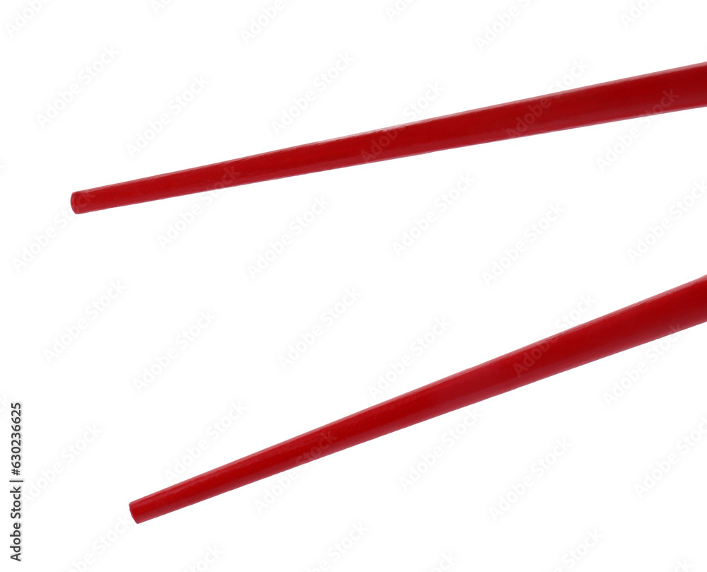 Pair of red chopsticks isolated on white Pair of red chopsticks isolated on white