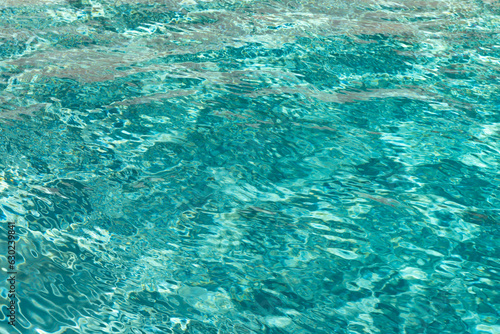 image of defocused turquoise pool background. defocused turquoise pool background