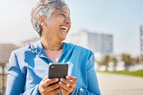 Funny, phone and fitness with old woman at beach for running, workout and mockup. Network, communication and contact with female runner laughing in nature for technology, sports and mobile app