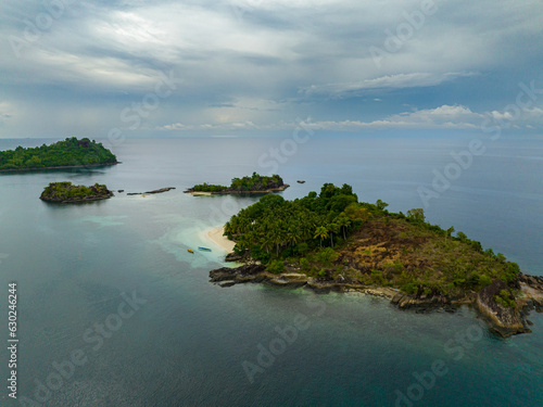 Fototapeta Naklejka Na Ścianę i Meble -  Beautiful white sand beaches and majestic rock formations in Once Islas of Zamboanga. Mindanao, Philippines.