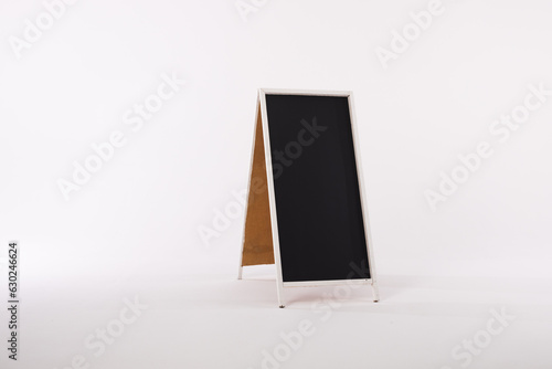 Black sign in white frame and copy space on white background