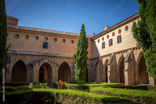 Cistercian cloister of the Monasterio de Piedra in Zaragoza, Aragon, Spain with vegetation inside