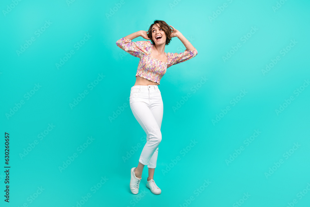 Full length photo of overjoyed positive person enjoy dancing clubbing empty space isolated on teal color background