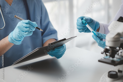 The atmosphere of a meeting room in a hospital, a weekly meeting between doctors discussing treatment and medicines and medical equipment used in treatment. Medical meeting concept.