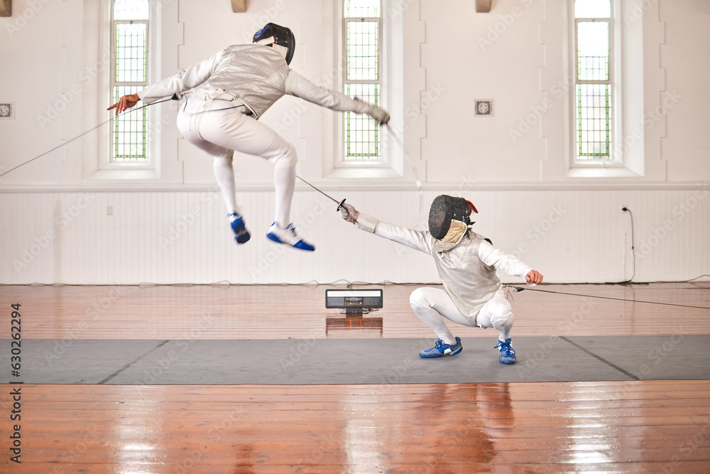 Fencing, sports and people fight, jump and training, fitness or workout for energy with epee sword in gym. Battle, fencer or athlete in performance, competition or exercise with sabre, helmet or suit