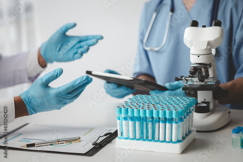 The atmosphere of a meeting room in a hospital, a weekly meeting between doctors discussing treatment and medicines and medical equipment used in treatment. Medical meeting concept.