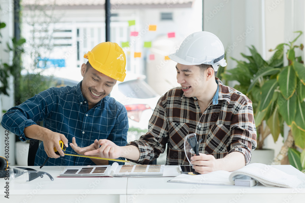 Asian engineer team and architects working designing planing of project, Home renovation concept. Asian engineer team and architects working designing planing of project, Home renovation concept.