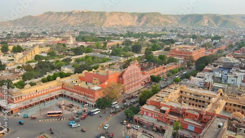 Jaipur, India: Aerial view of capital and largest city of Rajasthan, famous palace The Hawa Mahal, built from red and pink sandstone - landscape panorama of South Asia from above photo