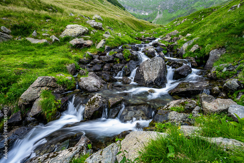 Summer landscape of the Fagaras Mountains, Romania. A view from the hiking trail near the Balea Lake and the Transfagarasan Road. photo