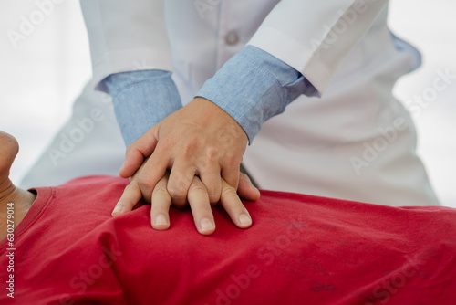 Emergency first aid CPR for men with a heart attack or shock. health care concept