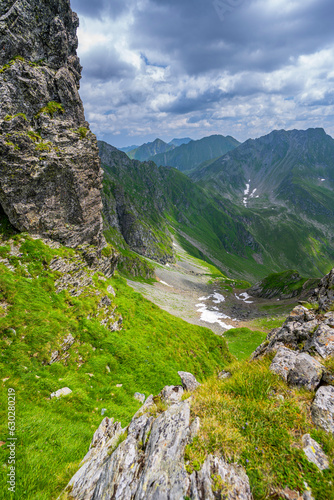 Summer landscape of the Fagaras Mountains, Romania. A view from the hiking trail near the Balea Lake and the Transfagarasan Road. photo