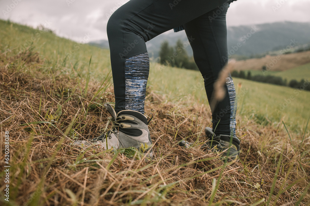 Hiking boot. Close up of a mountain hikers feet. High quality photo Hiking boot. Close up of a mountain hikers feet. High quality photo