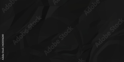 Dark crumple black paper wrinkled poster template ,blank glued creased paper texture background. black paper crumled backdrop background. used for cardboard and clarkboard.