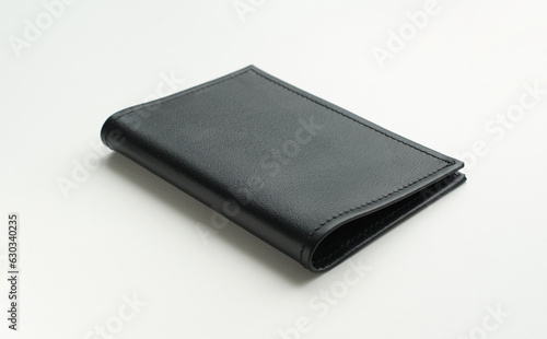 handmade leather black cover for documents from different sides isolated on white background