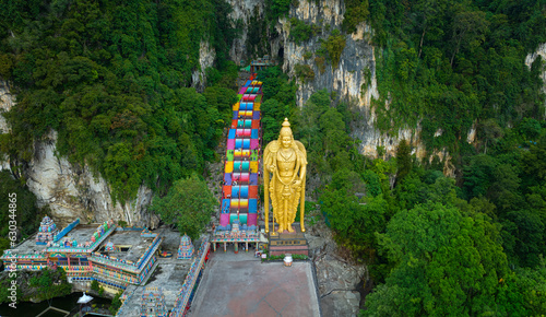 Photography Aerial view of Statue of Lord Muragan and entrance at Batu Caves in Kuala Lumpur, Malaysia Beautiful view of colorful stairs of Batu caves