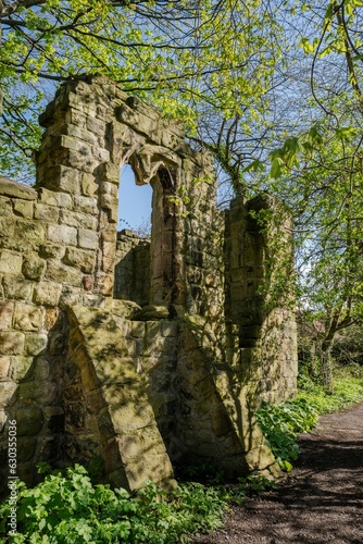 A vertical view of the ruins of St Mary's Chapel on the edge of Jesmond Dene, Newcastle upon Tyne UK