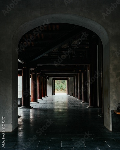 Dark corridor leading to a Vietnamese temple