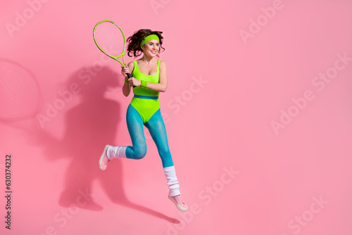 Photo of professional tennis player trainer lady feel positive winning tournament jump isolated pastel color background