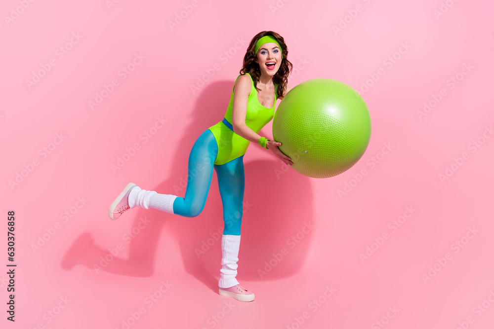 Photo of sporty trainer lady enjoy practice sport with pilates yoga fitball isolated on pastel color background Photo of sporty trainer lady enjoy practice sport with pilates yoga fitball isolated on pastel color background