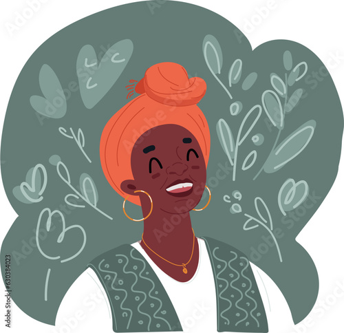 Portrait of smiling middle aged woman wearing african turban. Happy mid african american woman with hand on chin wearing traditional turban and looking at camera. Beautiful black mature woman at home.