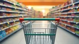 Shopping cart in supermarket and blurred store background.