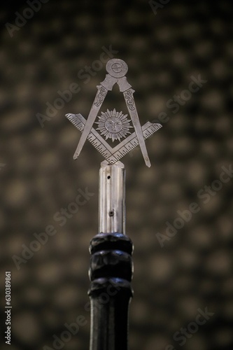 Принти на полотні Open masonic compass is displayed on top of a wine bottle: freemason concept