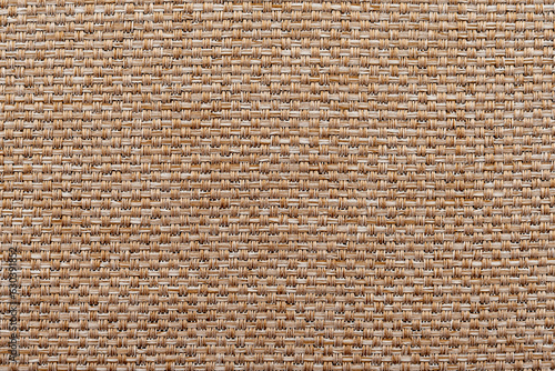 Texture of natural brown fabric or cloth. Fabric texture  natural cotton or linen textile material.  Canvas background. Decorative fabric for curtain, furniture, walls, clothes