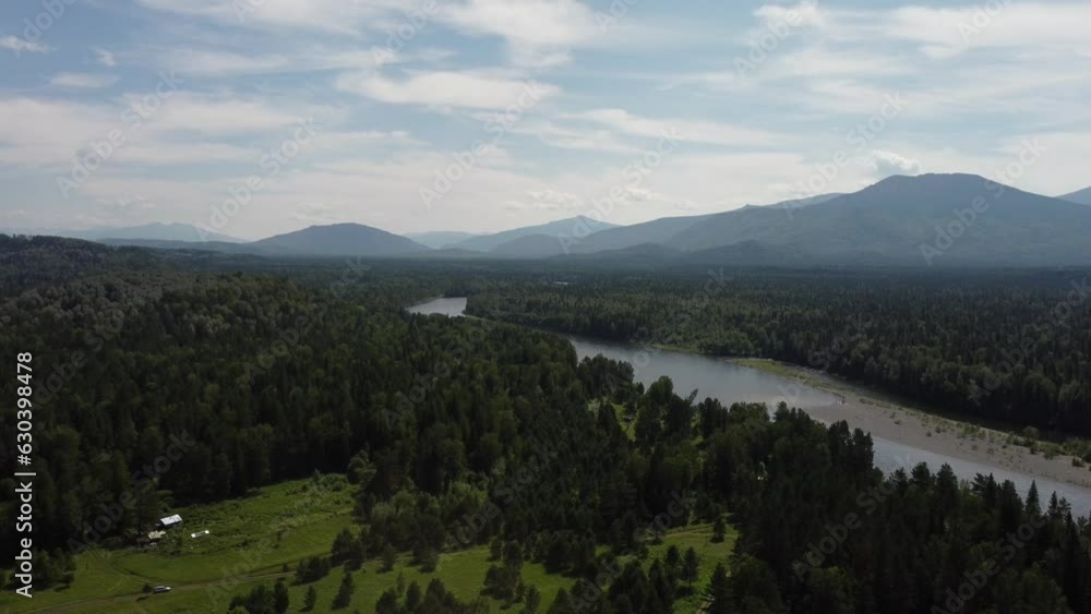 Aerial view of a river streaming through forest. Top view from drone, camera move toward. Forest, hills and river landscape Aerial view of a river streaming through forest. Top view from drone, camera move toward. Forest, hills and river landscape