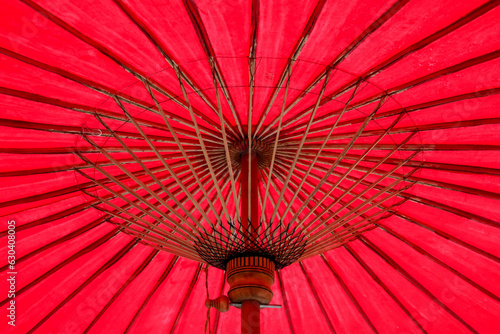 Under view of the red bamboo umbrella