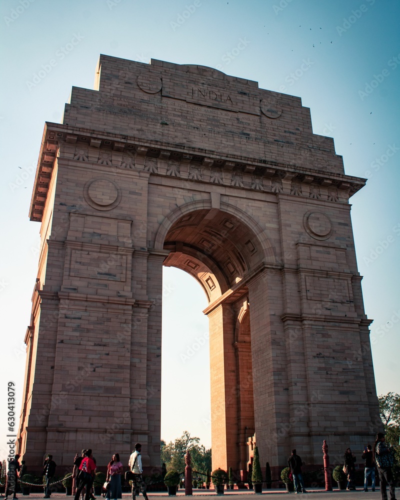 India Gate monument surrounded by a group of people