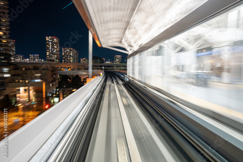 Motion blurred of train moving inside tunnel with daylight in tokyo, Japan.