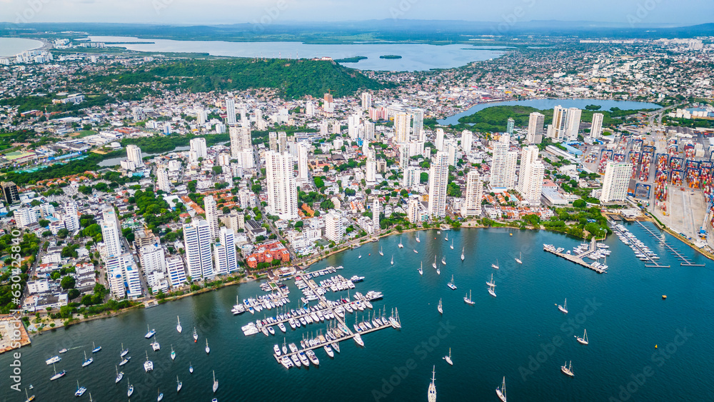 Aerial over the marinas and properties of the Manga neighbourhood of Cartagena, Bolivar, Colombia. Drone 