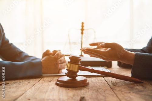 Lawyer and businessman discussing inside lawyer office to show mutual agreement to be legal advisor for businessman investment firm Collaboration. concept between businessman and legal consultant