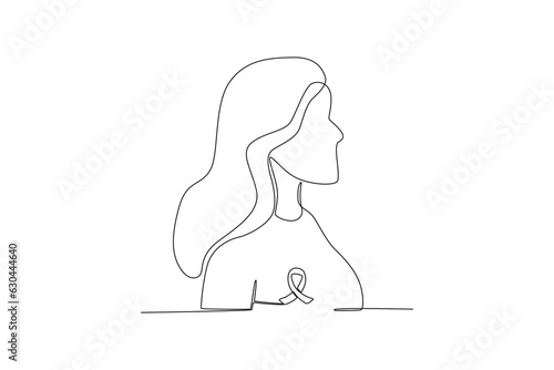 Side view of a woman wearing a breast cancer awareness ribbon. Breast cancer awareness month one-line drawing