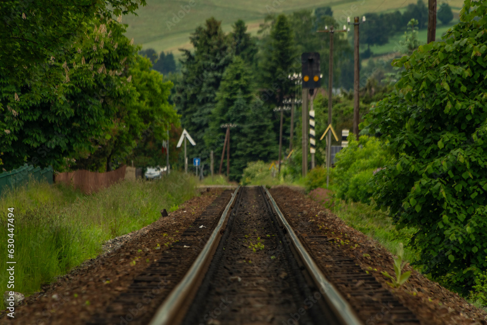 Railway tracks in summer cloudy day near Neudorf in Germany