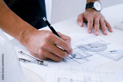 Architecture drawing on architectural project business architecture building construction and people concept.