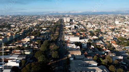 Wide boulevard with traffic and clear blue sky day - Avenida Wenceslau Braz, Fazendinha/Portão - Curitiba, Paraná. (ID: 630469839)