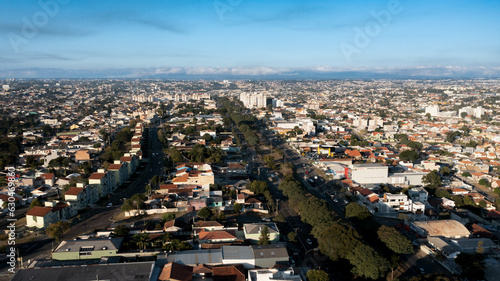 Wide boulevard with traffic and clear blue sky day - Avenida Wenceslau Braz, Fazendinha/Portão - Curitiba, Paraná. (ID: 630469860)