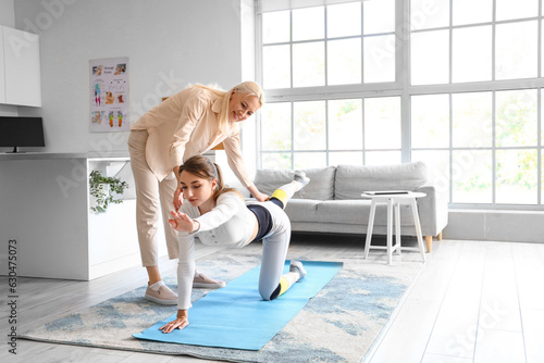 Female physiotherapist work...