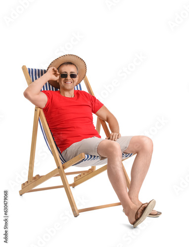 Mature man relaxing in deck...