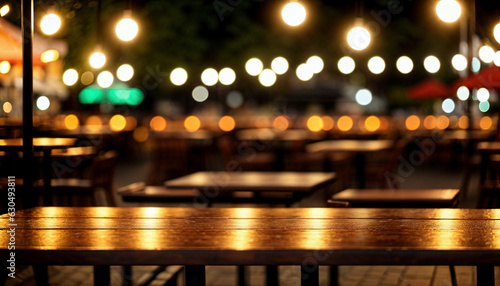 Empty wooden table and bokeh lights blurred outdoor cafe background, generative AI © Jenar