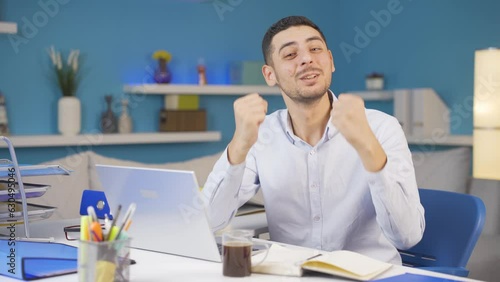 Home office worker man talking motivationally to camera. photo